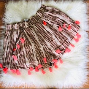Tan Tye-dye shorts w/neon coral tassels